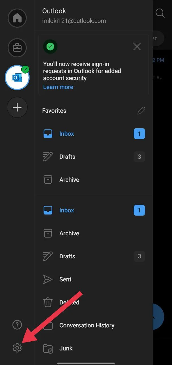 Tap the gear icon in the bottom left corner of the Outlook app to open settings