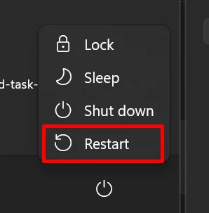 Windows Start menu open with the Power button highlighted showing the Restart option